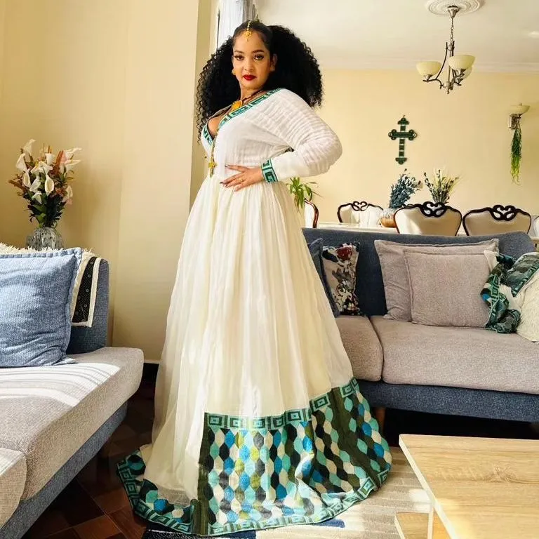 Timeless Chic: Wide Pattern Menen Fabric and Cotton Habesha Kemis - Elevate Your Style with Ethiopian Elegance